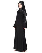 Opulent hand embroidered front open abaya with a unique twisted motif of sparkling sequins Black