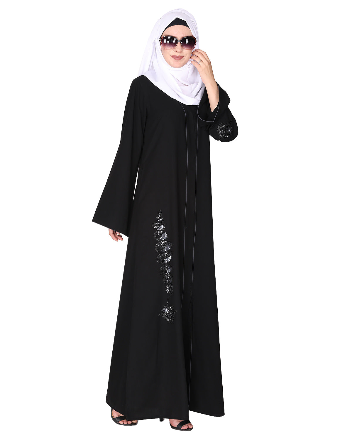 Opulent hand embroidered front open abaya with a unique twisted motif of sparkling sequins Black