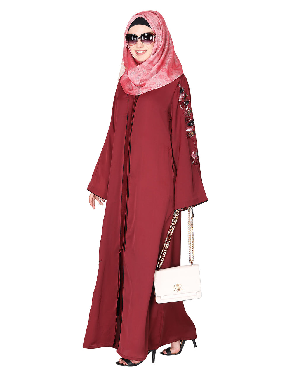 Opulent hand embroidered front open abaya with a unique twisted motif of sparkling sequins Maroon