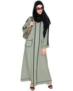 Pocket Dubai Style Abaya with Black detailing Sage Green
